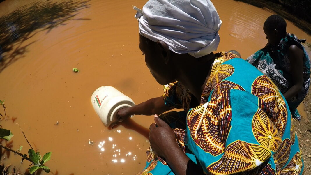 Photo: In the rural areas of Kenya, the burden of collecting, carrying and managing water (often contaminated) has always rested on the shoulders of women. Credit: Robert Kibet | IDN-INPS