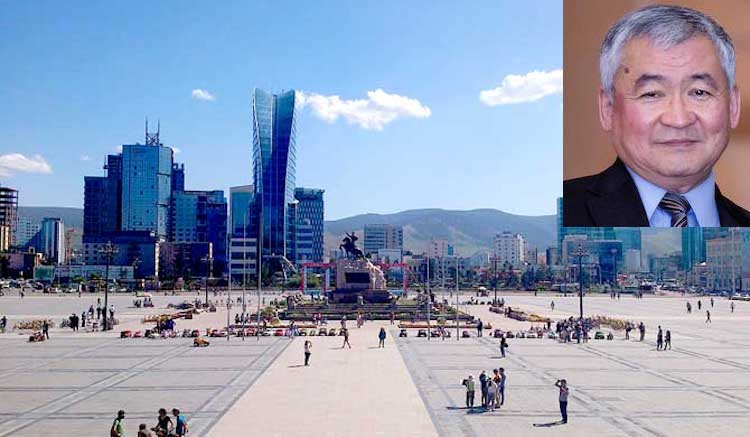 Photo: Dr Jargalsaikhan Enkhsaikhan (Credit: Global Peace Foundation) against the backdrop of Chinggis Khaan (Sükhbaatar) Square in Ulaanbaatar, the capital and largest city of Mongolia. CC BY-SA 4.0