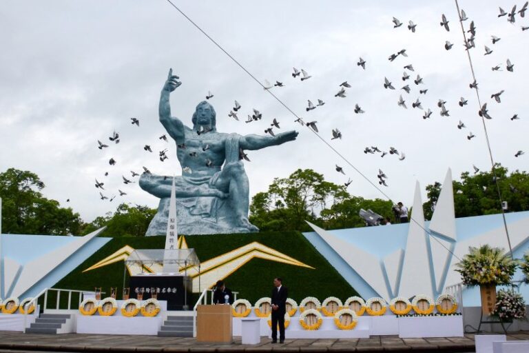 Doves are leased over the peace statue in Nagasaki, during a ceremony to mark the 80th anniversary of the US atomic bombing