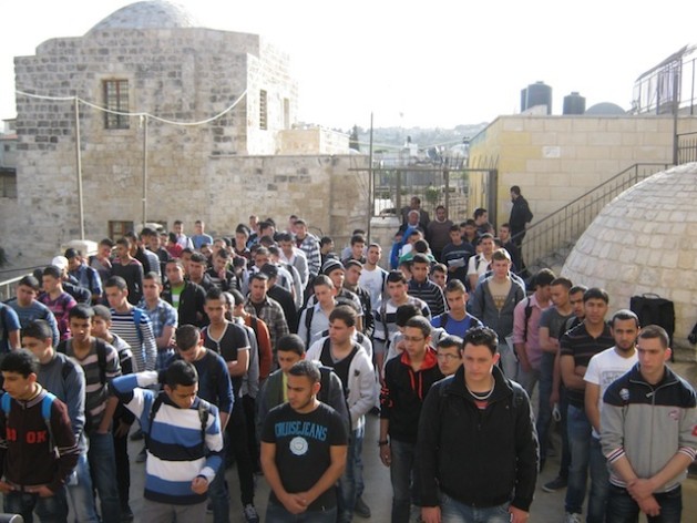 Palestinian youth in the Old City of Jerusalem are taught a different version of historic events than their Israeli counterparts. Credit: Pierre Klochendler/IPS