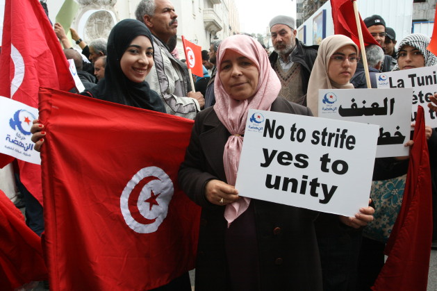 Women demonstrating for unity in Tunis. Credit: Louise Sherwood/IPS.