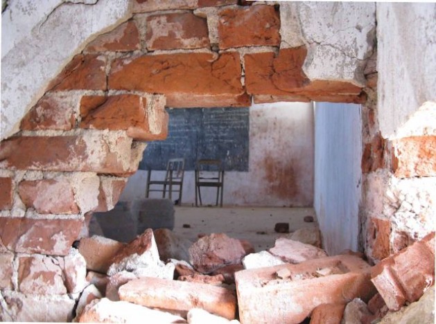 Naxalite fighters exploded two bombs in Belhara High School, Jharkhand, on the evening of Apr. 9, 2009. One bomb, on the school's lower floor, blasted a hole in the wall between the two classrooms, as well as outside the wall. Credit: Bede Sheppard/Human Rights Watch (India)