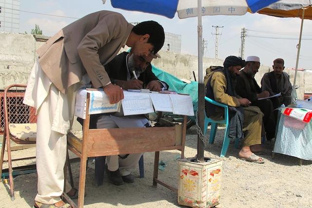 ‘Copyists’ (transcribers) in Afghanistan can earn up to one dollar for each letter or document they prepare for their illiterate customers. Credit: Karlos Zurutuza/IPS