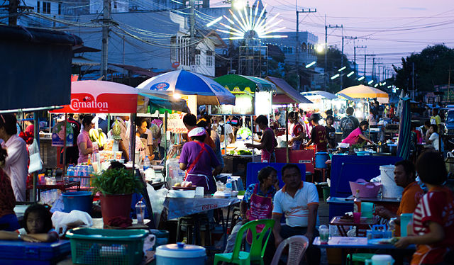 One of the main streets in Yasothon was turned into a street food market during the Yasothon Rocket Festival/ By Takeaway - Own work, CC BY-SA 3.0