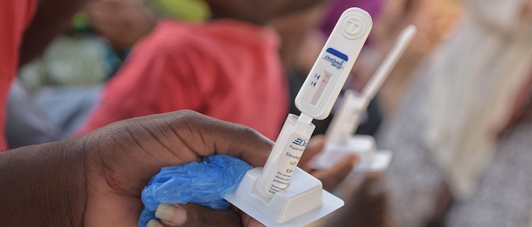 Photo: Showing a HIV self-test. Credit Zuberi Mussa