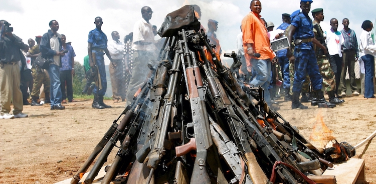Photo: Weapons being burnt during the official launch of the Disarmament, Demobilization, Rehabilitation and Reintegration (DDRR) process in Muramvya, Burundi. Source: Africa Renewal.