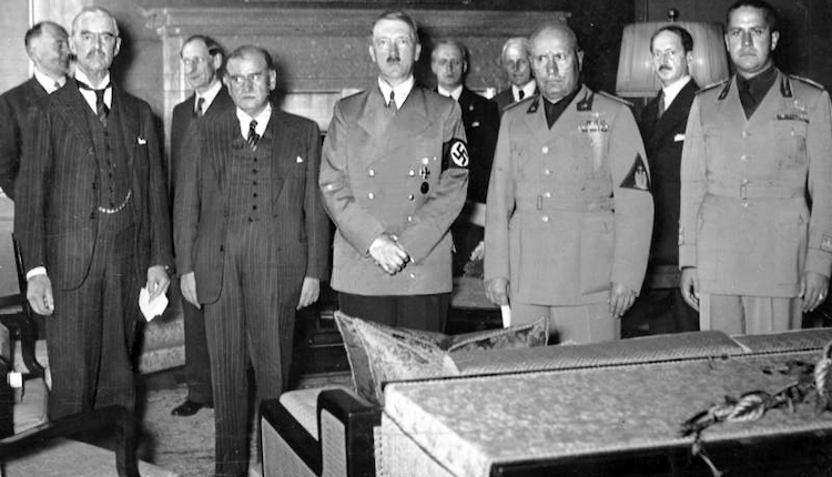 Photo: Chamberlain, Daladier, Hitler, Mussolini, and Ciano pictured just before signing the controversial Munich Agreement in 29 September 1938. Credit: Federal German Archive, Koblenz CC-BY-SA 3.0