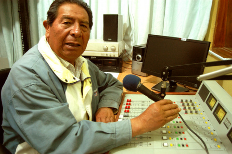Donato Ayma in the Atipiri radio station booth. Credit: Franz Chávez /IPS
