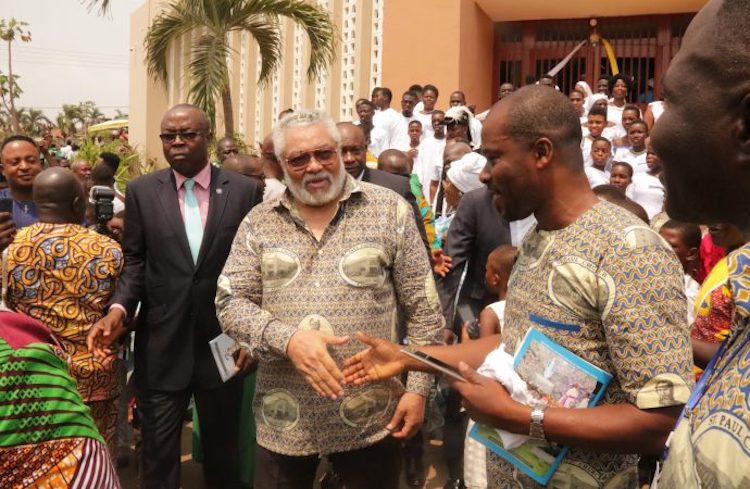Photo: Former Ghanaian leader Jerry John Rawlings, centre, greets people outside St. Paul's Catholic Church February 2, 2020. Rawlings, a Catholic, died November 12 at age 73 in the nation's capital, Accra. Credit: Damian Avevor/CNS.