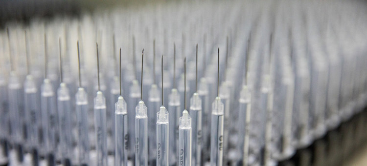 Photo: Syringes are assembled and then packaged in a facility in Spain. © UNICEF/Francis Kokoroko