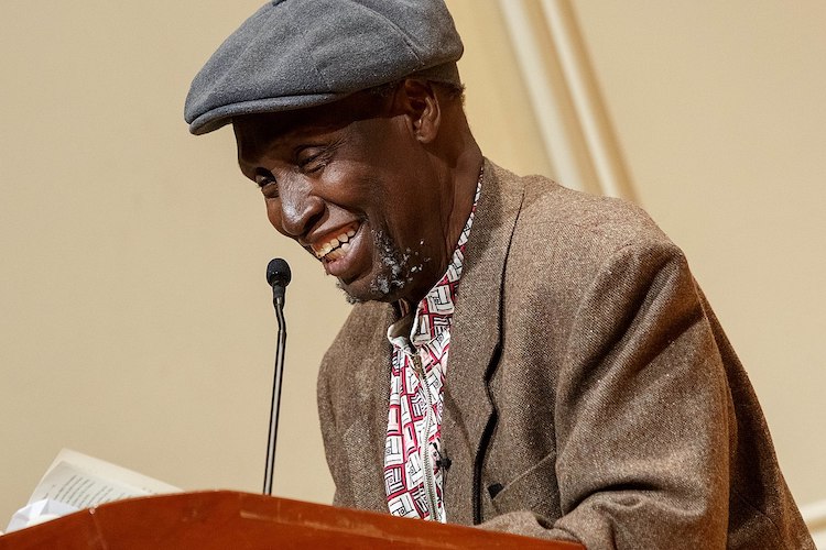Photo: Ngũgĩ reading at the Library of Congress in 2019. Source: Wikimedia Commons.