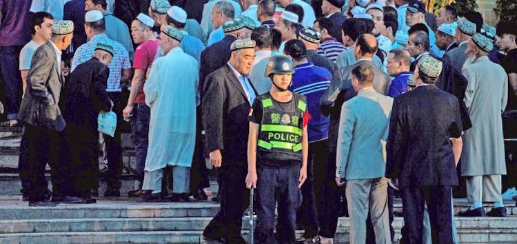 Photo: Hanization raising discontent among Uyghur Muslims in Xinjiang. Credit: The Kootneeti.