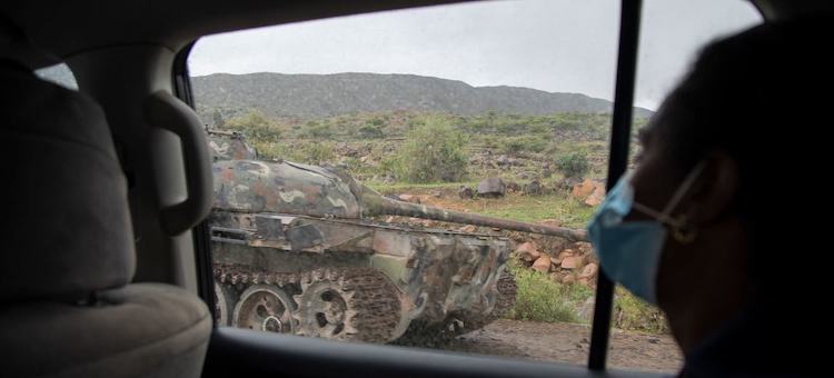 Photo: An armoured vehicle is left abandoned on a road in Tigray, Ethiopia, on July 20, 2021. © UNICEF/Christine Nesbitt