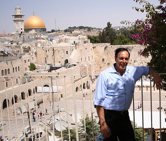 Dr. Ben-Meir in Jerusalem, Israel. The Temple Mount sits in the background./ By MikeAbdullah - Own work, CC0