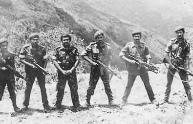 TTE leaders at Sirumalai camp, India in 1984 while they are being trained by RAW (from L to R, weapon carrying is included within brackets) - Lingam; Prabhakaran's bodyguard (Hungarian AK), Batticaloa commander Aruna (Berreta SMG), LTTE founder-leader Prabhakaran (pistol), Trincomalee commander Pulendran (AK-47), Mannar commander Victor (M203) and Chief of Intelligence Pottu Amman (M 16)./ By http://sundaytimes.lk/970119/plus4.html, Fair use