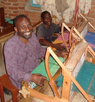 Wheelchair-bound weavers at Neema Crafts in Iringa. Credit: Sarah McGregor/IPS