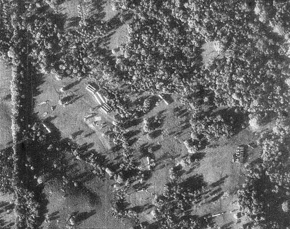 This U-2 reconnaissance photo showed concrete evidence of missile assembly in Cuba. Shown here are missile transporters and missile-ready tents where fueling and maintenance took place.・By CIA - ImageTransferred from en.wikipedia, Public Domain